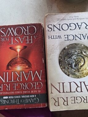 George R.R. Martin Paperback Book Pair - Red & Cream Covers
